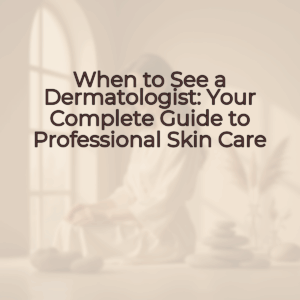 A woman with radiant, clear skin gently touches her cheek with a genuine smile. Her elegant posture and minimalist surroundings embody a luxurious, spa-like feel.