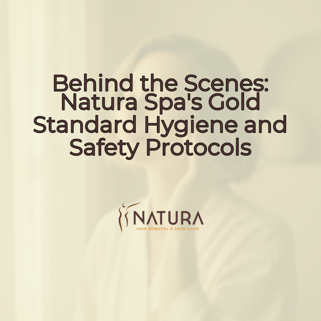 A woman with short hair and minimalist style, natural glowing skin, relaxed pose touching her face, and a confident smile, set against a soft, warm natural background with diffused lighting.