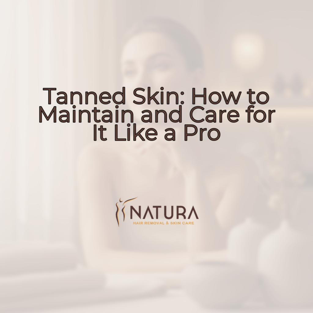 A woman with glowing skin, soft makeup, and a confident smile, touching her face in a relaxed pose.