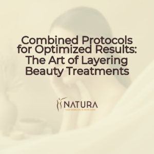 A woman with radiant skin in a spa-like setting, embodying tranquility and natural beauty. Soft, warm lighting enhances her features as she gently touches her face, reflecting a serene and confident glow. The background is softly blurred, accentuating the focus on her pristine skin and promoting a luxurious, trustworthy, and natural spa atmosphere.