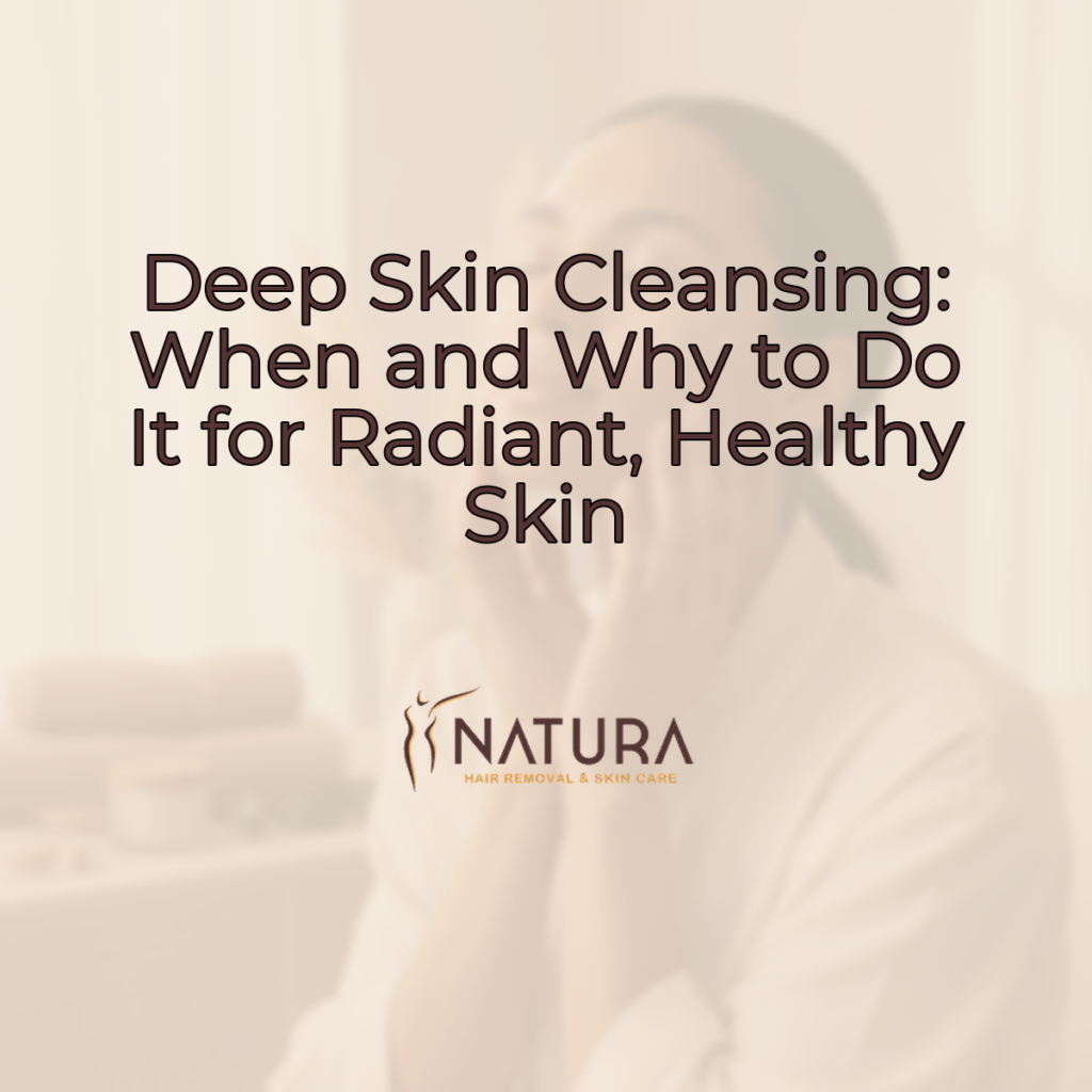 A woman with glowing skin, showcasing a relaxed smile and touching her face with a gentle pose in a soft, warm natural light background.