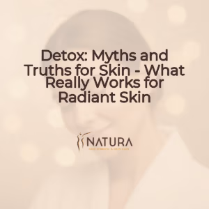 A serene image of a woman with her eyes closed and a soft smile, gently touching her glowing skin, set against a blurred background in warm, natural tones, evoking a spa-like tranquility and luxurious natural skincare.