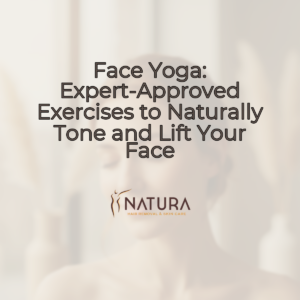 A woman's face, framed naturally, with a serene expression and soft, diffused light highlighting her glowing skin. Her eyes are closed, suggesting relaxation and peace. Her hands are gently touching her face, as if engaging in a skincare routine or facial yoga.