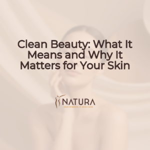 A woman with glowing skin, showcasing a clean beauty routine against a soft, warm background.