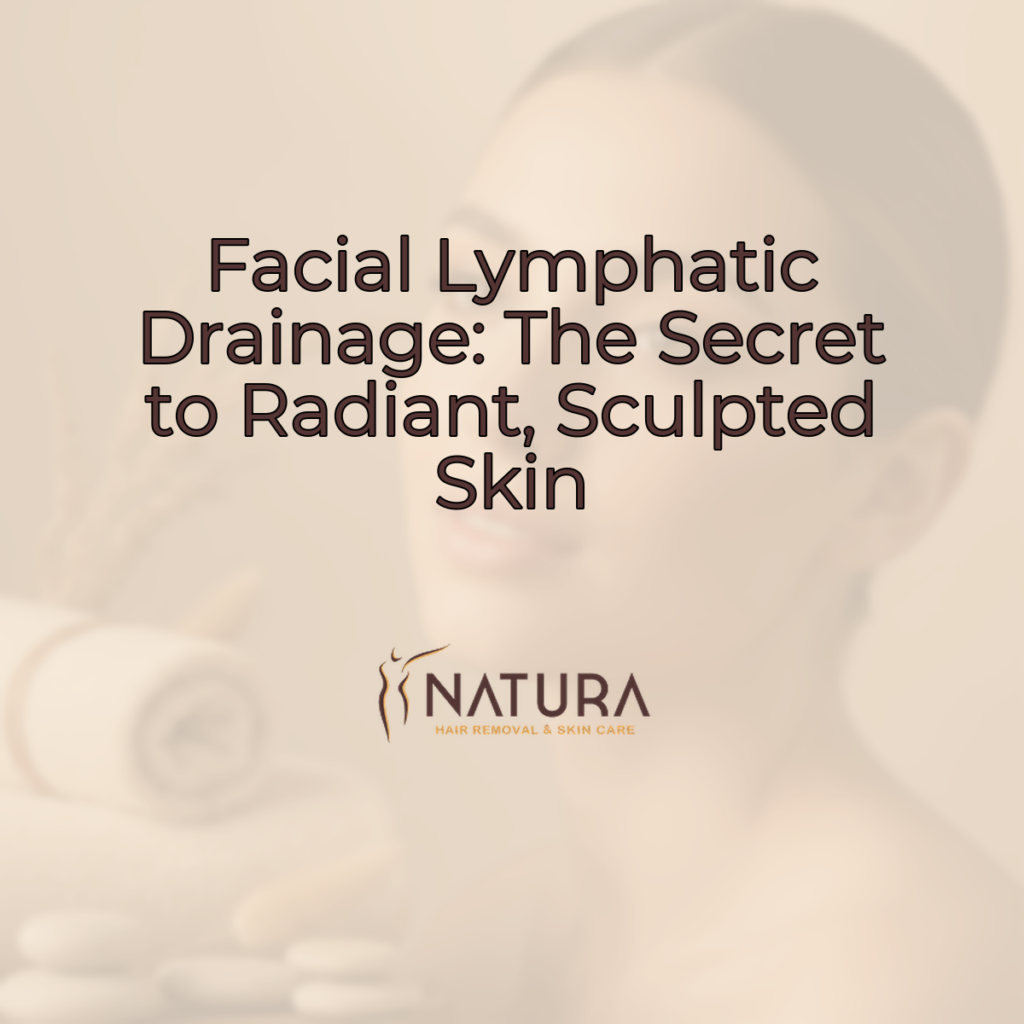 A woman with radiant skin, natural makeup, and a confident smile, gently touching her face. Soft, diffused lighting highlights her features against a blurred background in warm beige, cream, and soft brown tones.