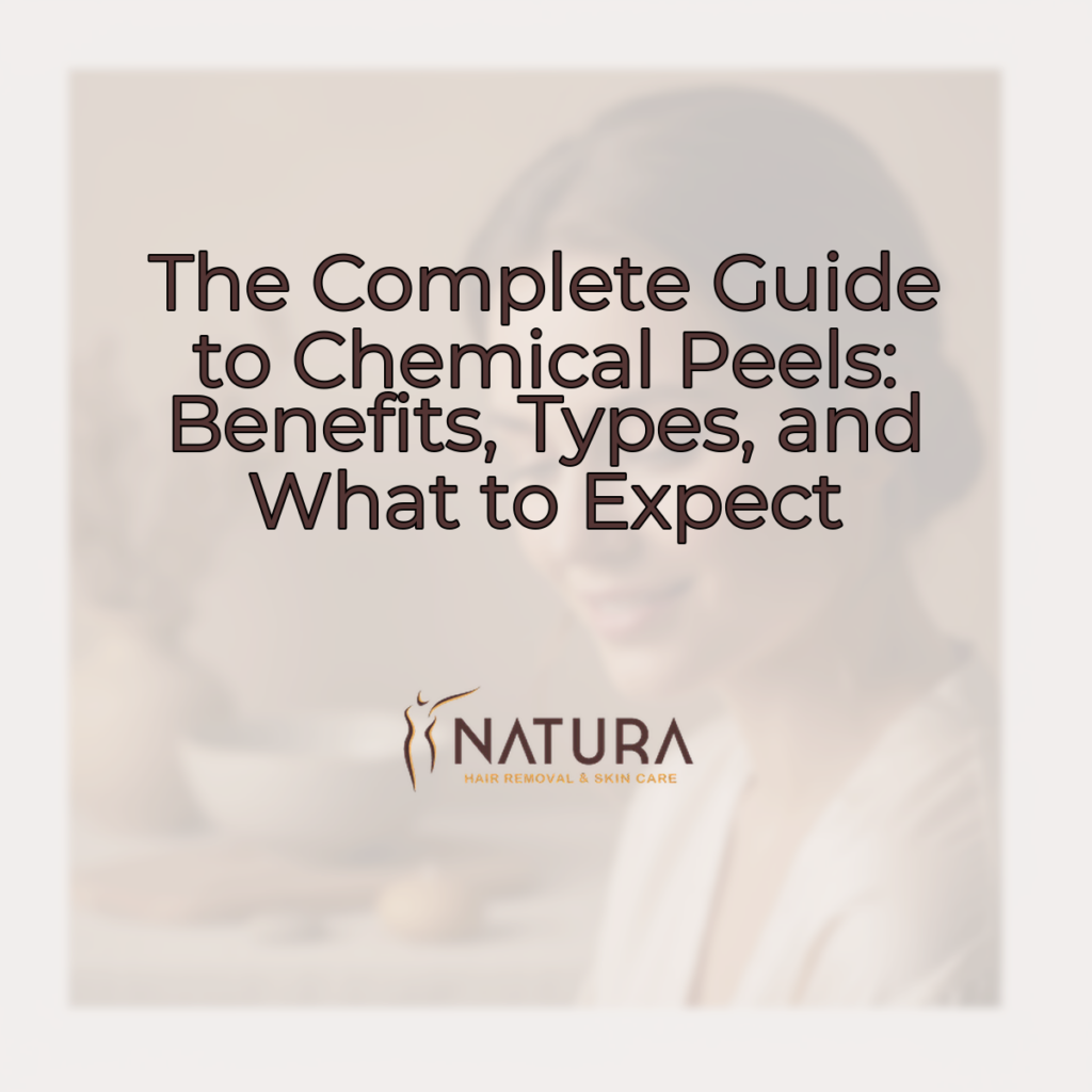 A woman with glowing skin, soft smile and relaxed pose. The background is blurred natural tones.