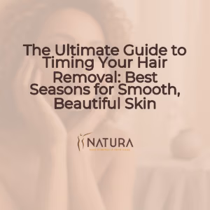 A serene skincare promotional image with a woman of diverse skin tone, a natural glow, and a confident smile, set against a soft, blurred background in warm beige and brown tones.