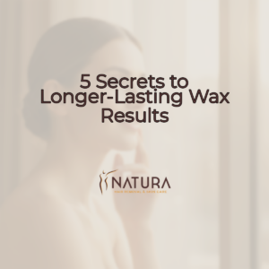 A serene, luxurious spa setting in natural beige and brown tones with a minimalist logo.