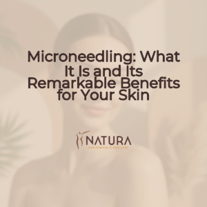 A woman with naturally glowing skin smiling, touching her face, in a soft, warm, and natural setting.