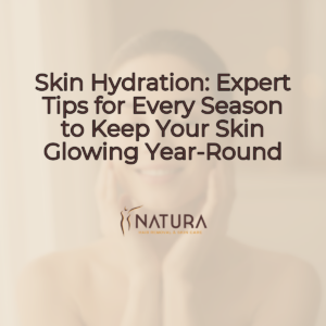 A woman's face, eyes closed, with natural glowing skin, a relaxed pose touching her face, and a confident smile, all in a warm, soft focus with a blurred, creamy background. The overall aesthetic is luxurious and spa-like.