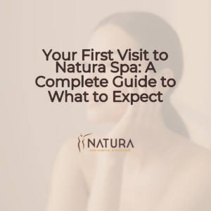 A serene woman with glowing skin touching her face, soft lighting, warm beige and brown tones.