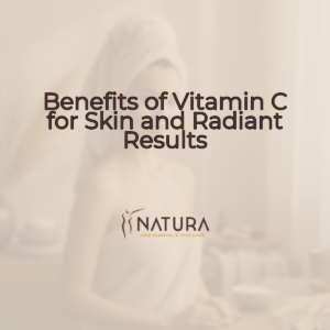 A woman with glowing skin in a spa setting, representing the benefits of Vitamin C for skin.