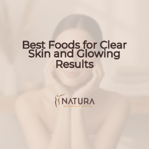 A close-up of a smiling woman with dewy, glowing skin, gently touching her face. The background is a soft, warm beige with blurred natural elements.