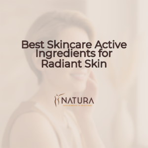 A serene, sun-drenched spa interior with minimalist decor, soft beige and cream tones.