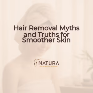 A serene, luxurious spa setting with warm, diffused lighting. A woman with glowing skin, in a towel wrap, is gently touching her face with a relaxed, confident smile.