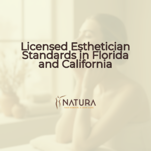 A woman's serene half-profile with glowing skin, touching her face, against a softly blurred, warm-toned background.