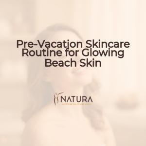 A woman with glowing skin, eyes closed in a relaxed pose, with a genuine smile. Soft, diffused lighting and a blurred background.