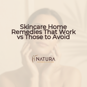 A woman with naturally glowing skin, a genuine smile, in a relaxed pose, touching her face. The image has a soft, warm, natural aesthetic with blurred background.