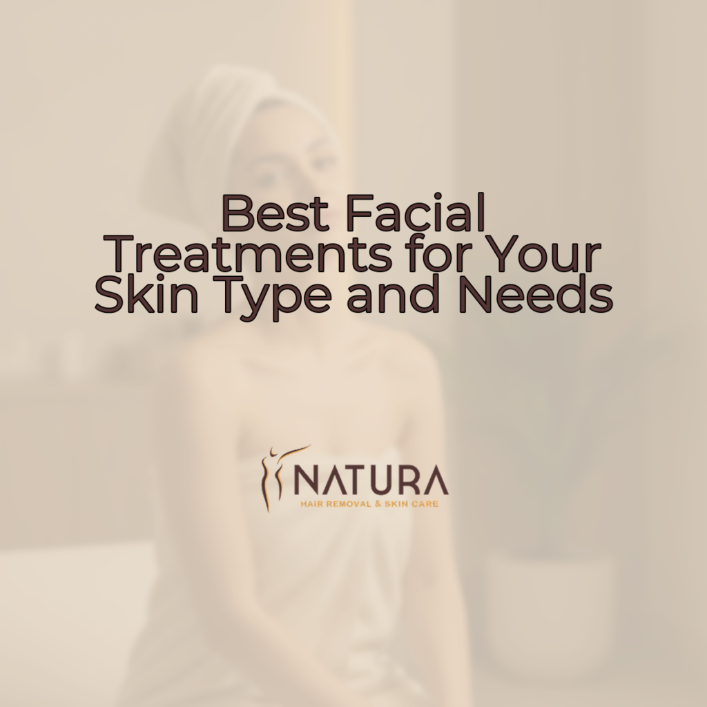 A woman in a towel wrap, in a spa setting, with natural glowing skin and a relaxed pose, touching her face with a confident smile.
